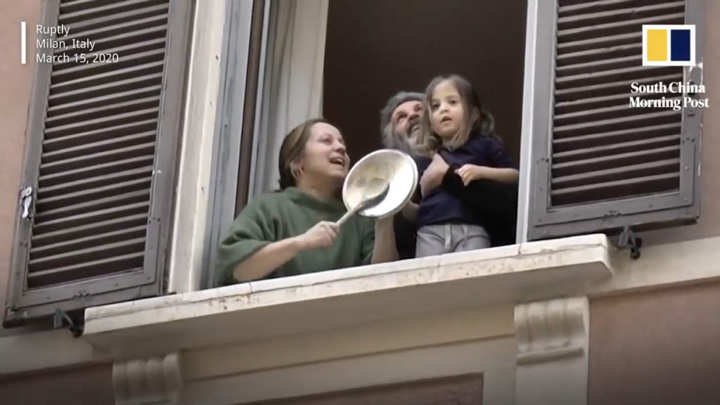 Italians making music from their balcony
