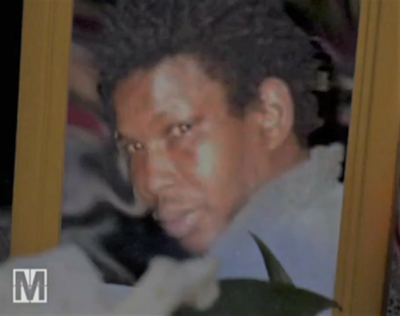Picture of Oury Jalloh, victim of black police brutality alongside George Floyd