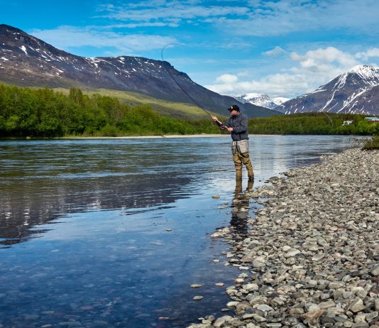 man fishing on the river - vidar-nordli-mathisen_unsplash